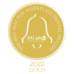Logotipo dorado del sello de campana MHA